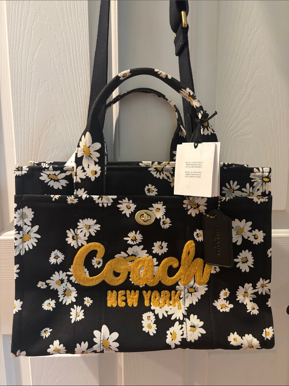 Coach Black Daisy Canvas Tote with Gold Script Logo